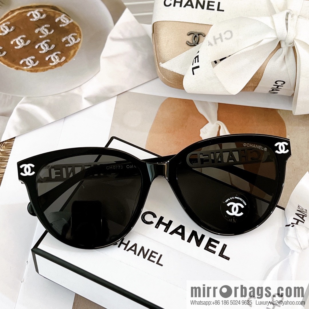 Chanel women's sunglasses with half circle drill letters