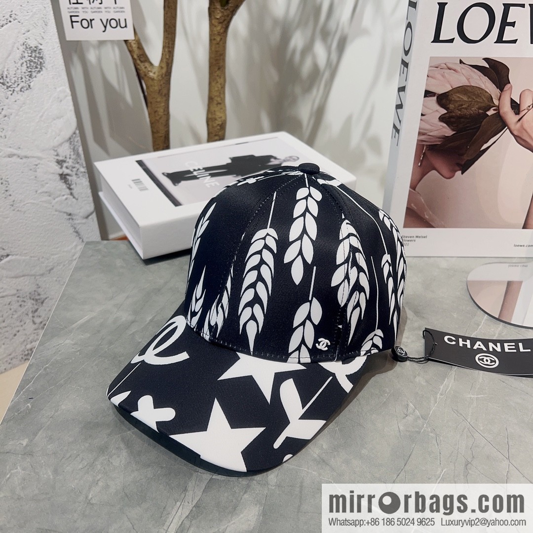 Chanel color-matching black and white flower cap