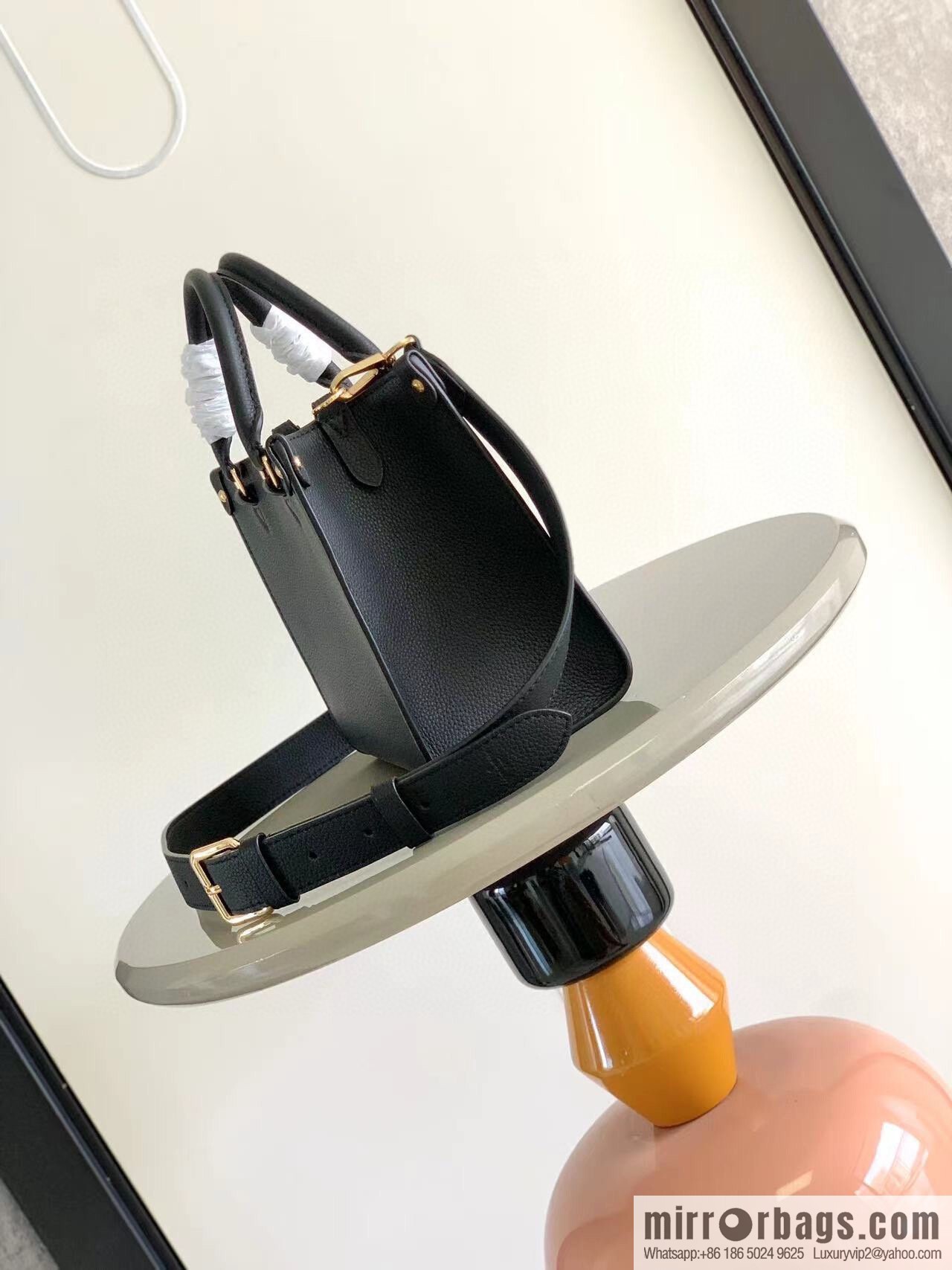 LV M22311 LOCK & GO handbag