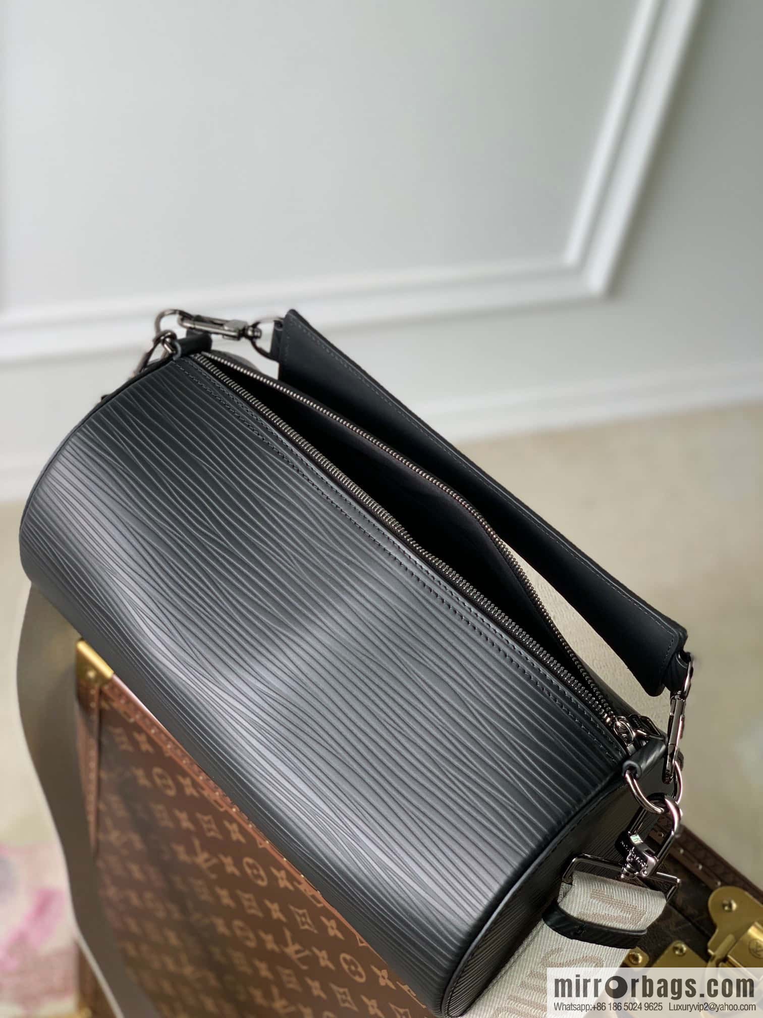 M23092 black Soft Polochon handbag