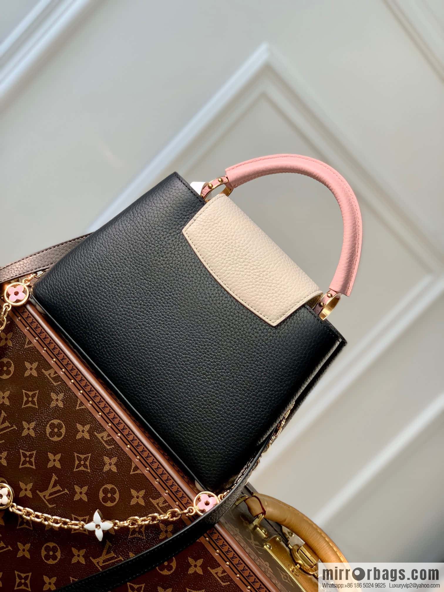 M22375 black small, this Capucines small handbag.