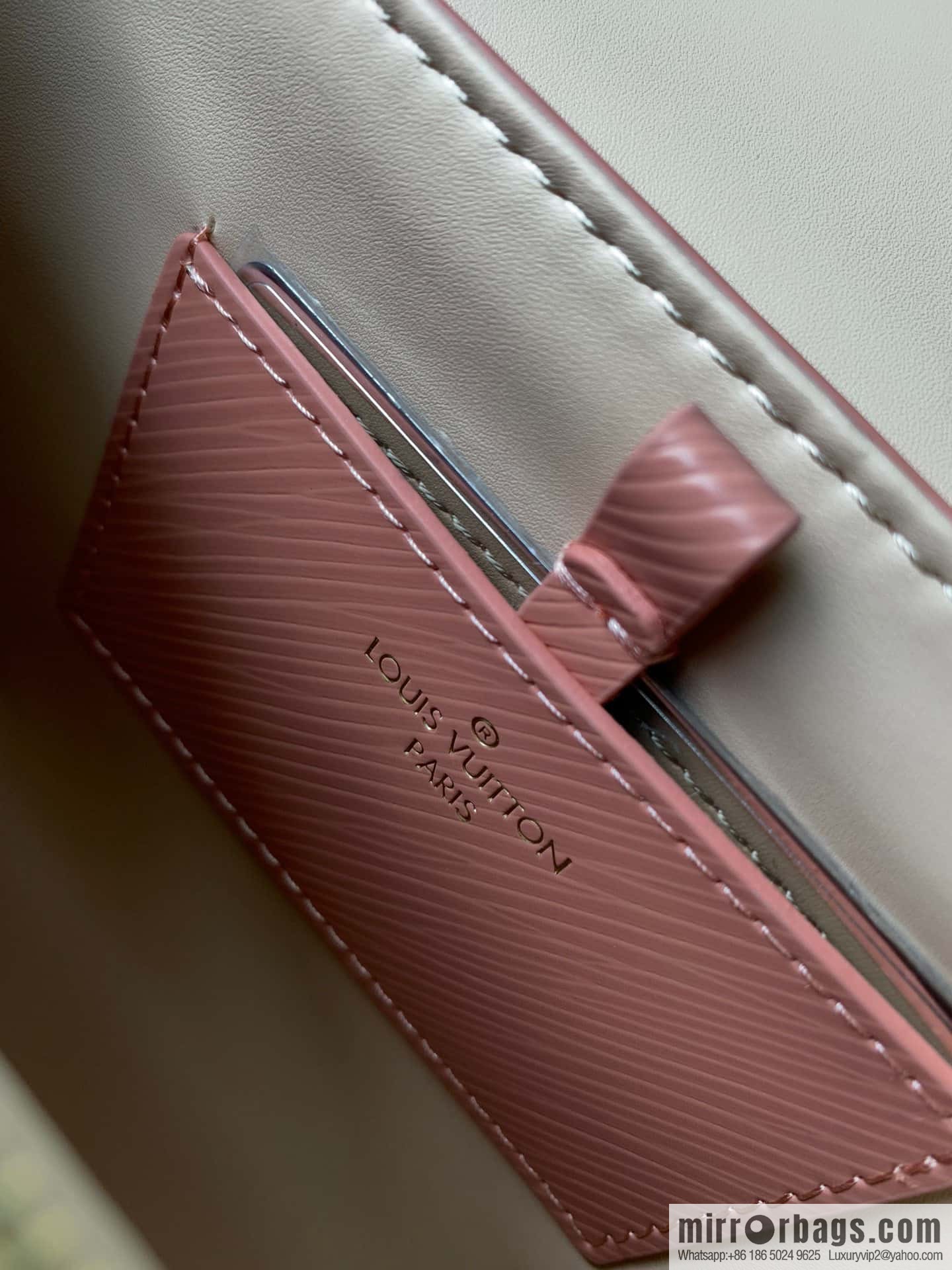 M23074 TWIST small handbag