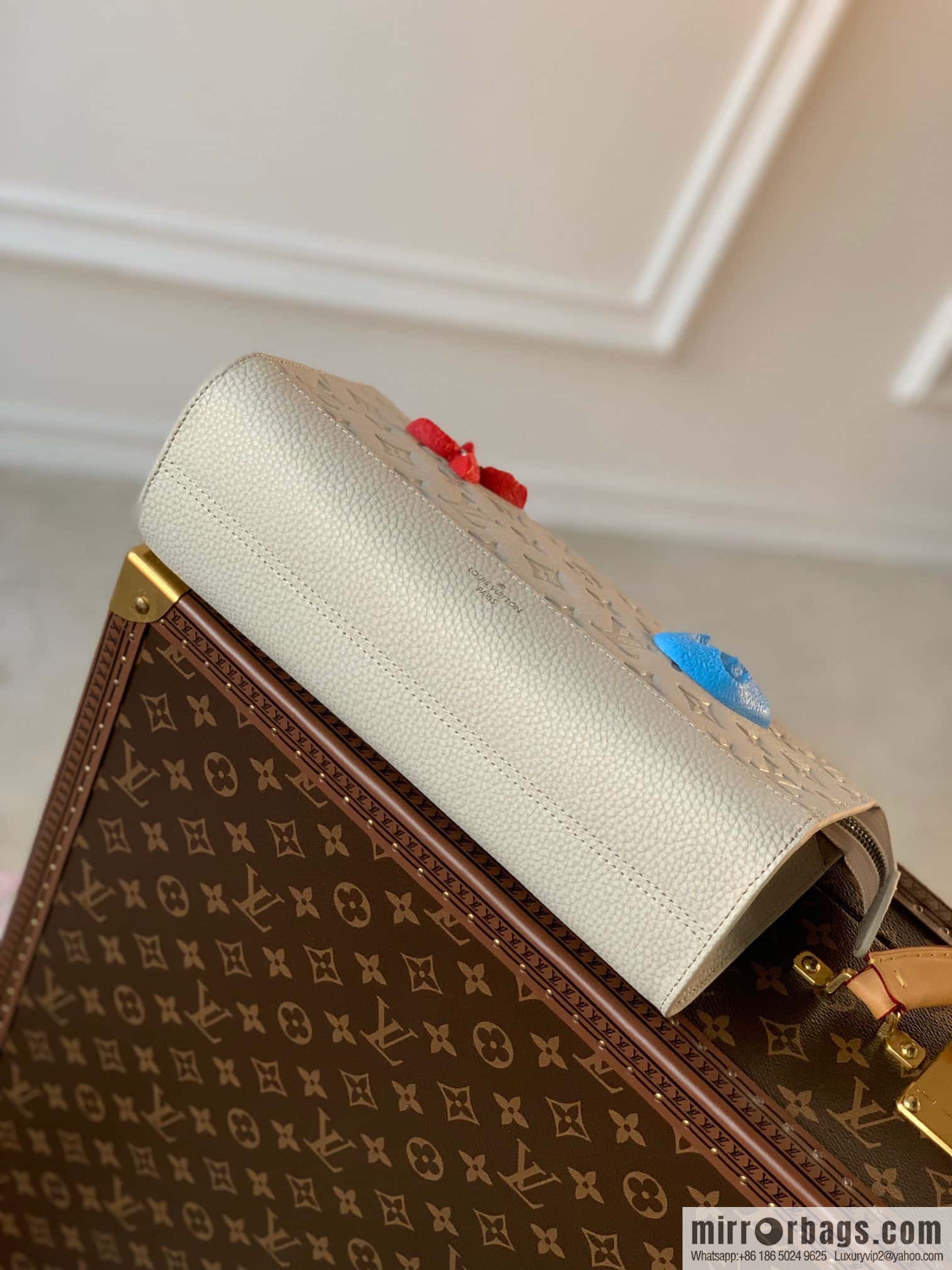 M81556 White clutch bag 1934 Louis Vuitton Sac Tricot handbag