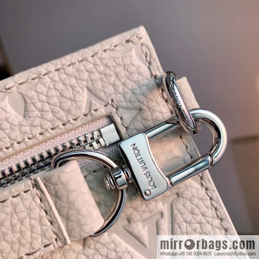 M81556 White clutch bag 1934 Louis Vuitton Sac Tricot handbag