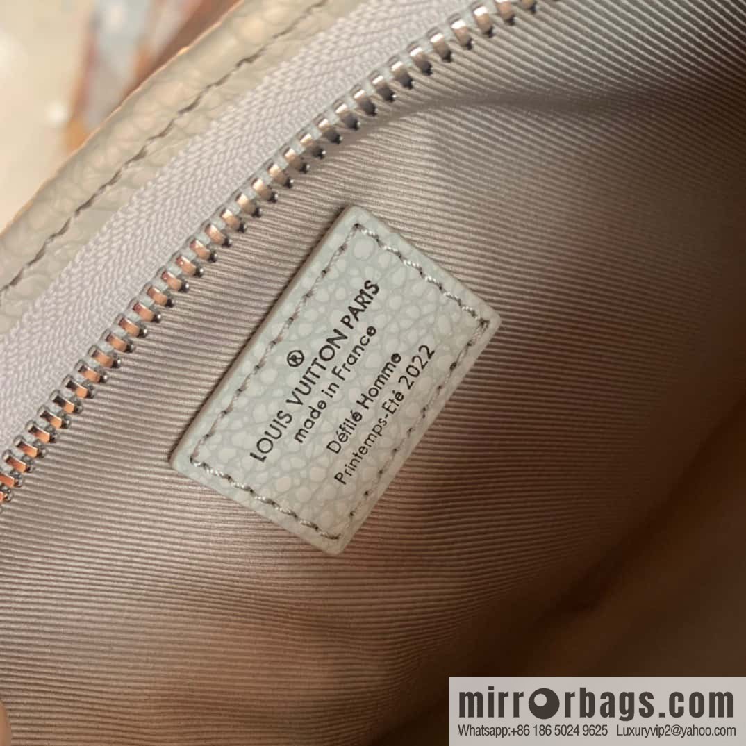 M81556 White clutch bag 1934 Louis Vuitton Sac Tricot handbag