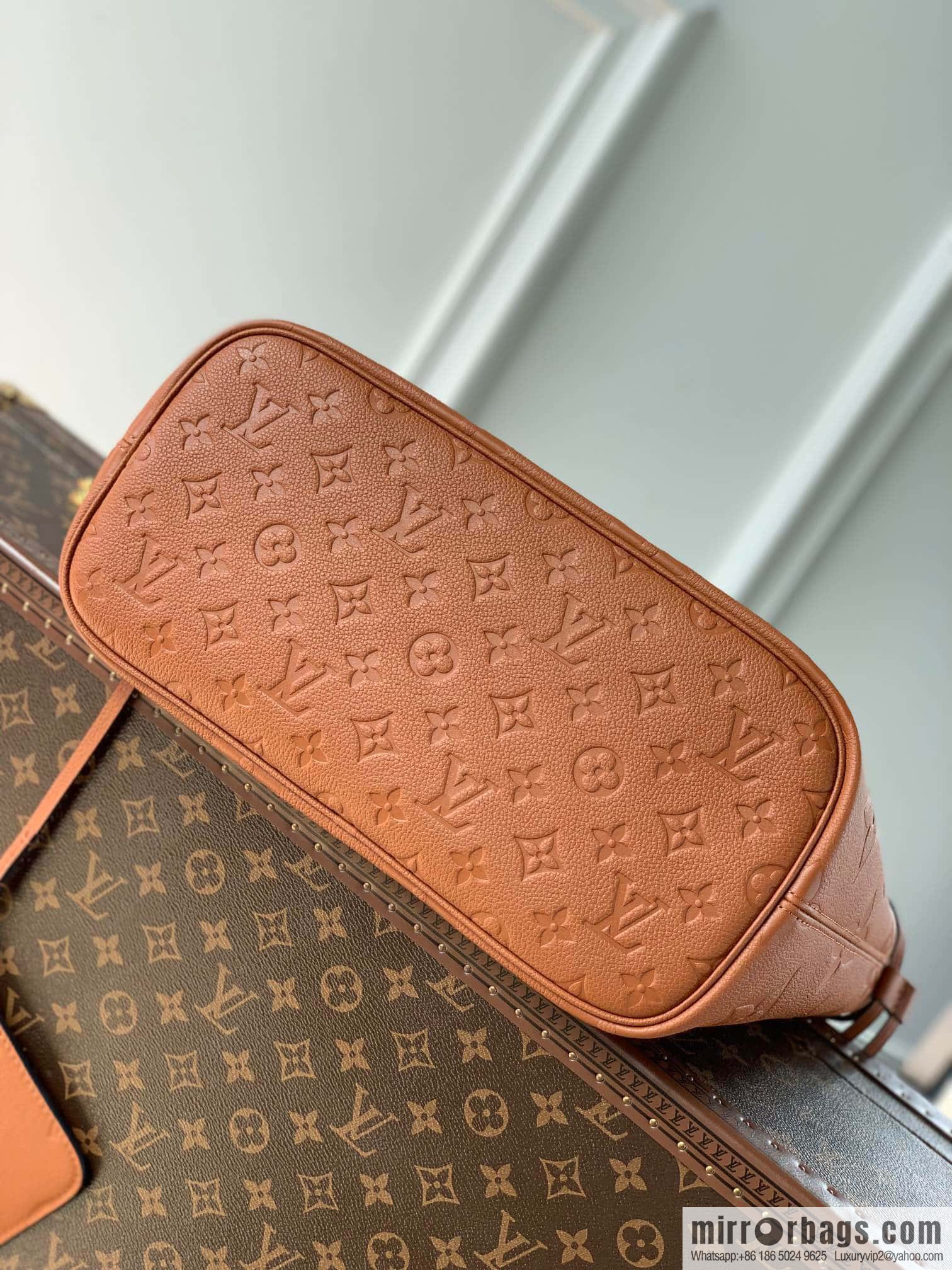 M45684 Full leather embossed Neverfull medium shopping bag