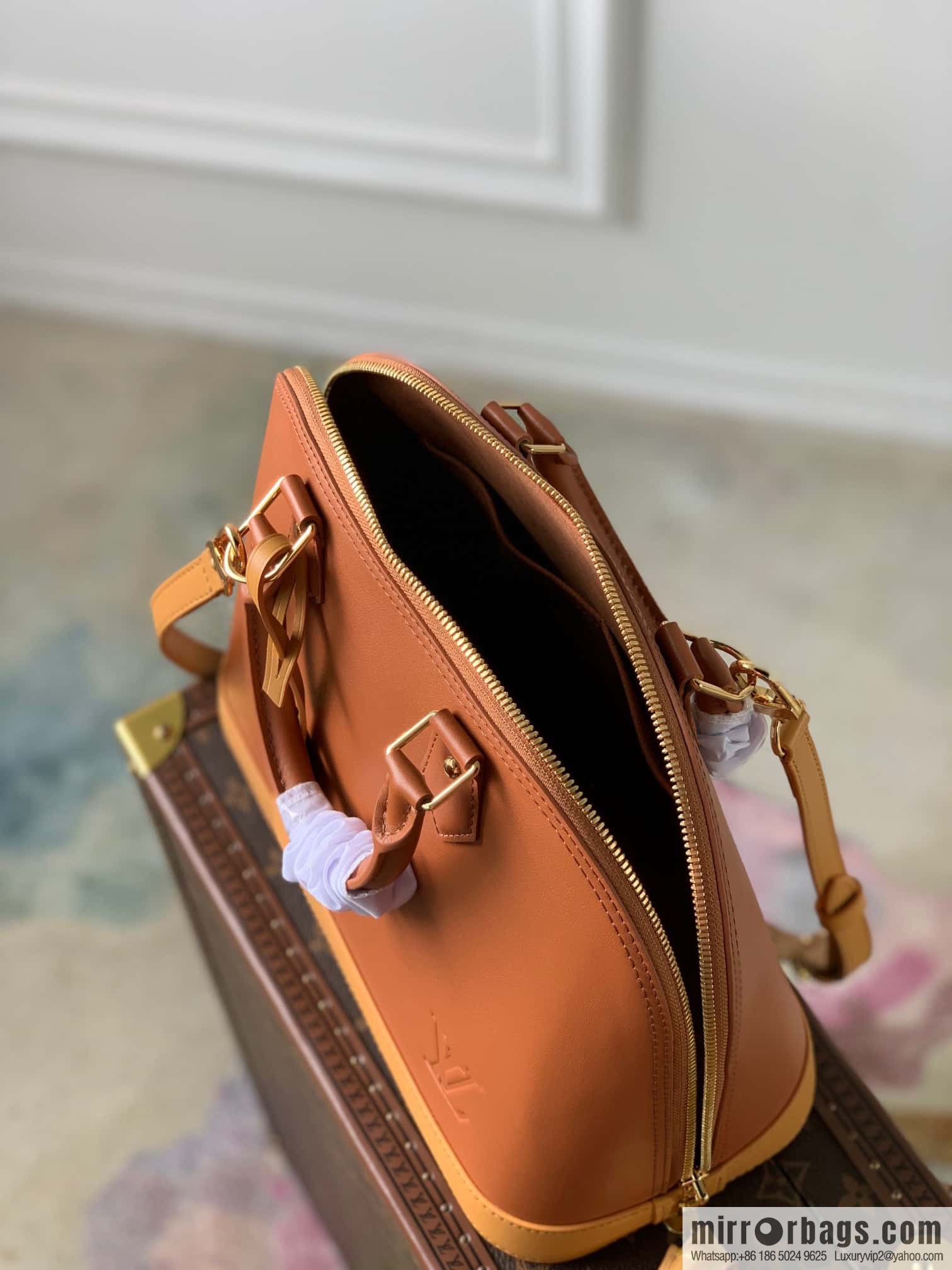 LV shell bag Alma small handbag M91611