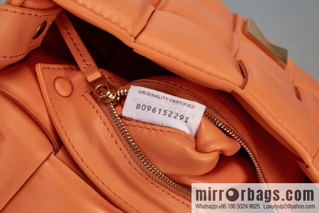 Bottega Veneta Padded Cassette Bag Model; 591970 BV Cassette Pillow Bag, Orange Orange