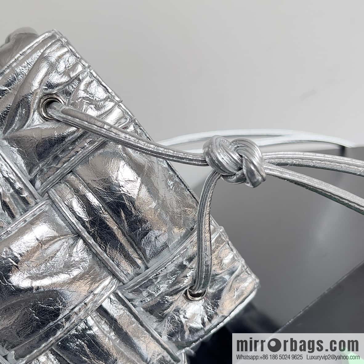 BottegaVeneta Bv small bucket bag pleated leather woven bucket bag model number: 717187 silver