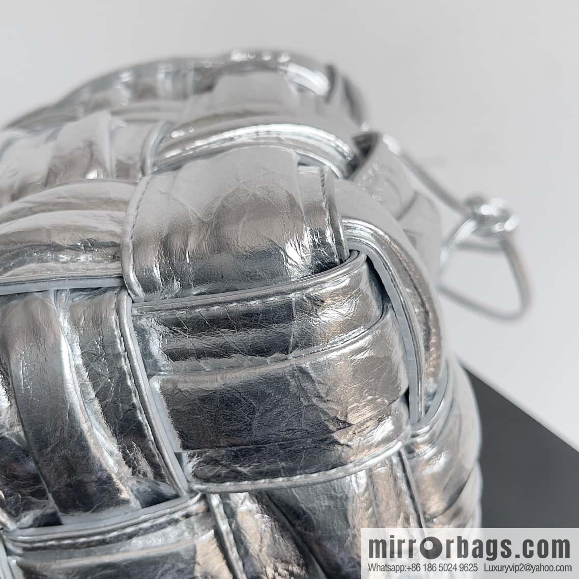 BottegaVeneta Bv small bucket bag pleated leather woven bucket bag model number: 717187 silver