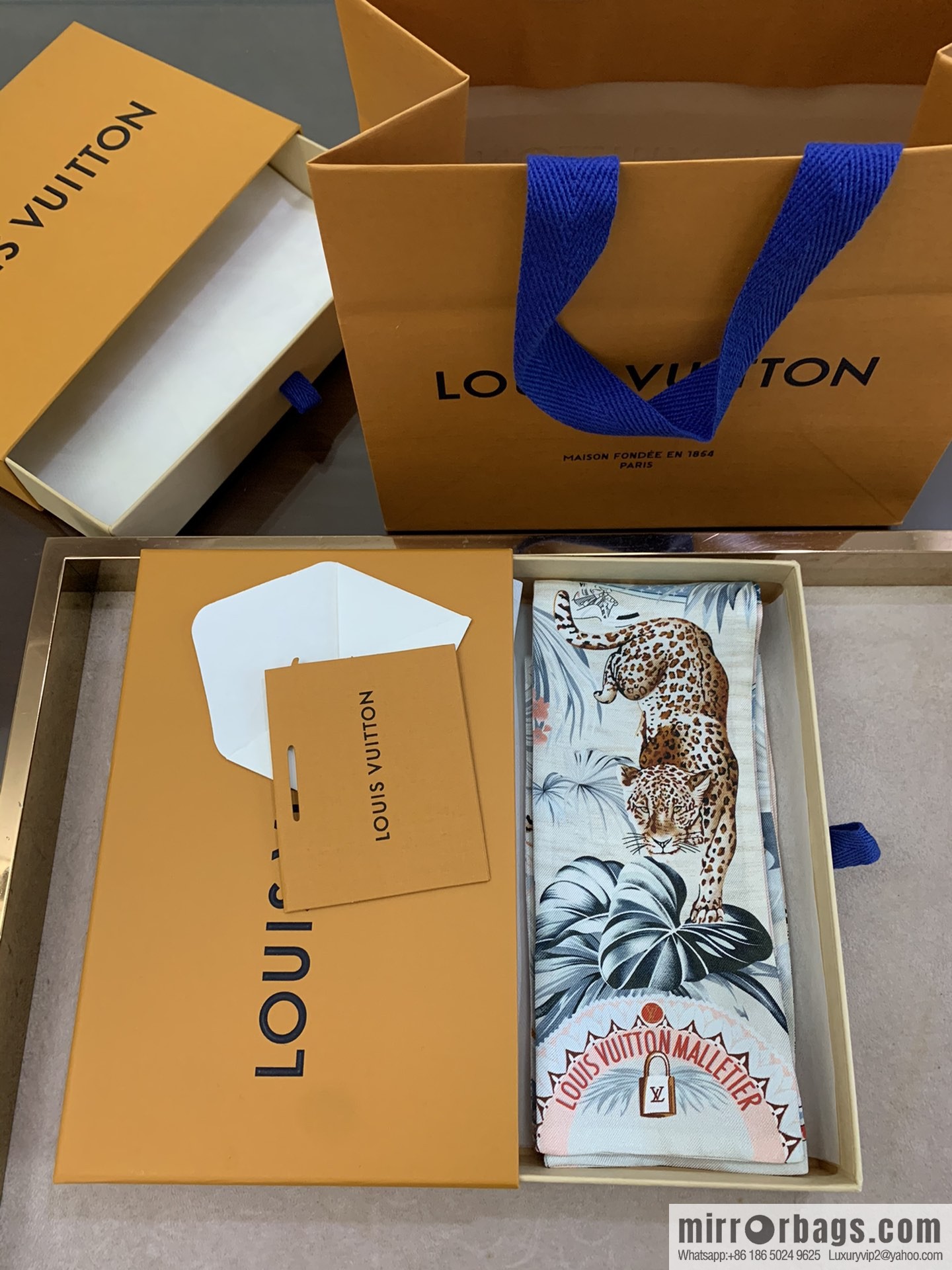 LV Louis Vuitton Voyage Extraordinaire Hair Band M73856