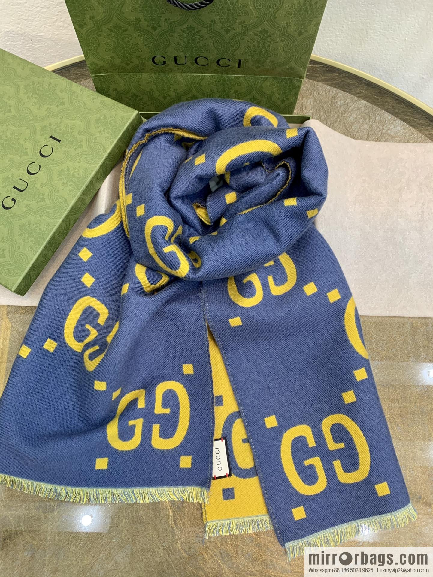 GUCCI Gucci GG pattern wool scarf 495592