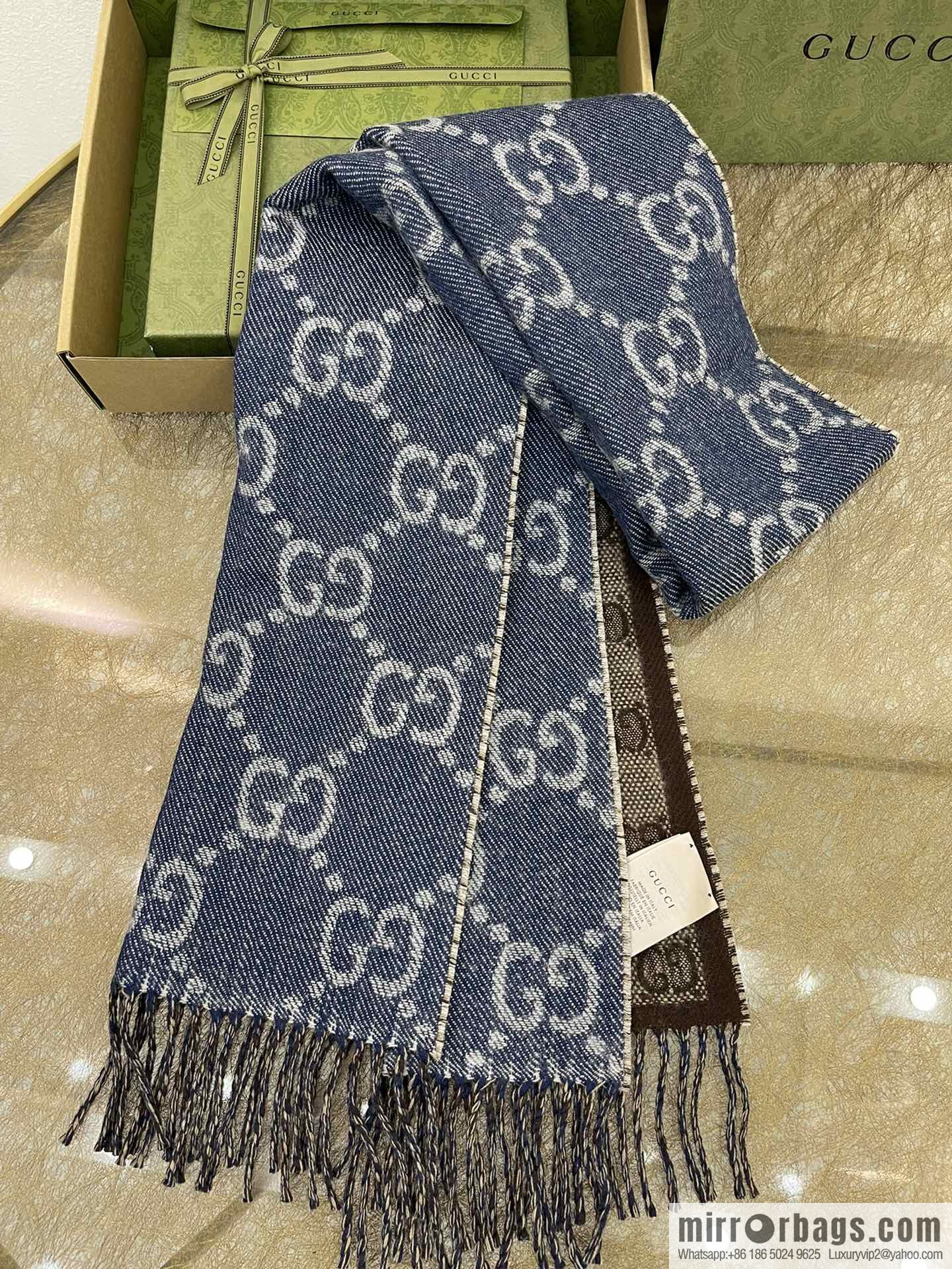GUCCI Gucci GG pattern double-sided wool scarf 676610