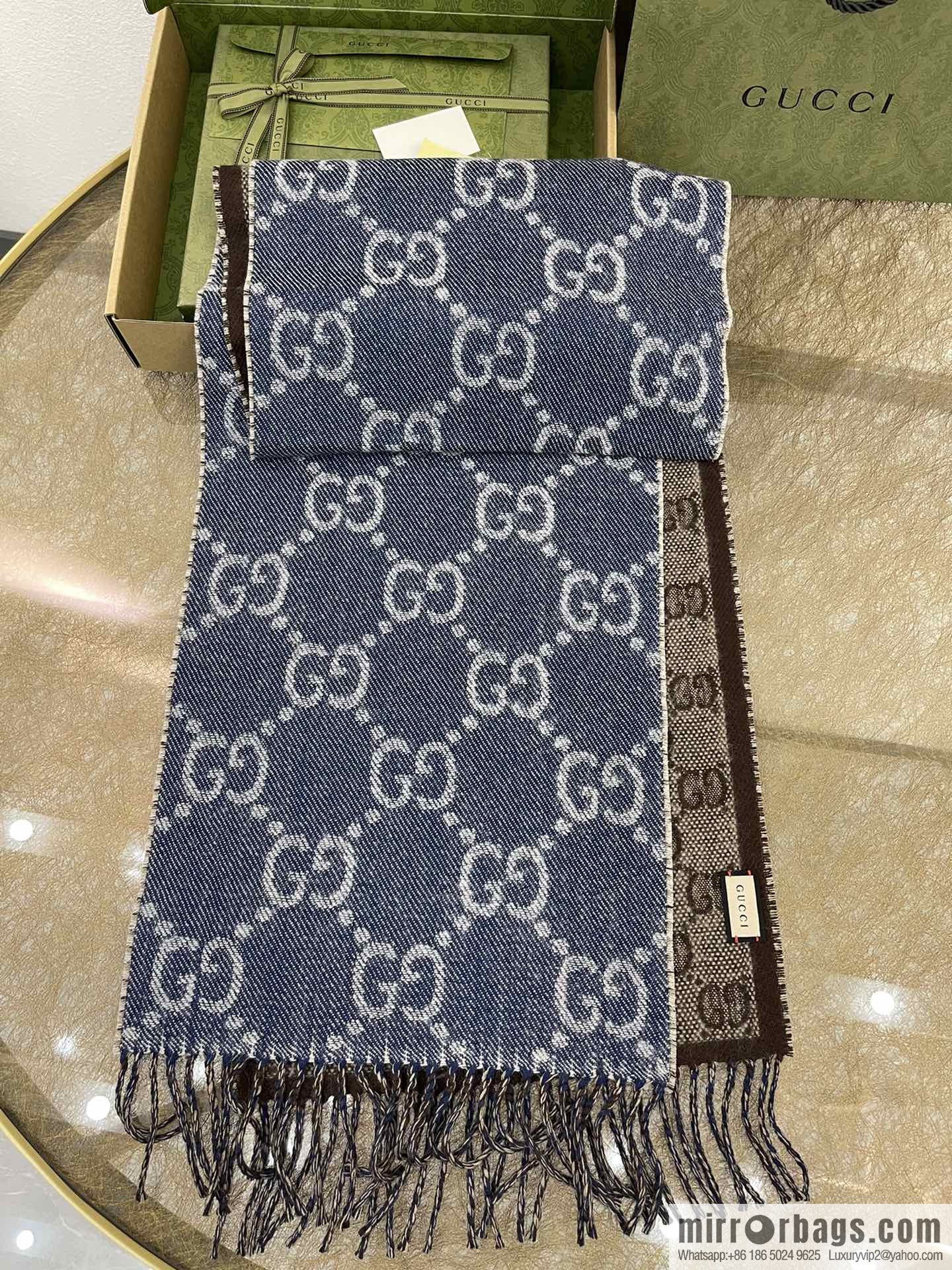 GUCCI Gucci GG pattern double-sided wool scarf 676610