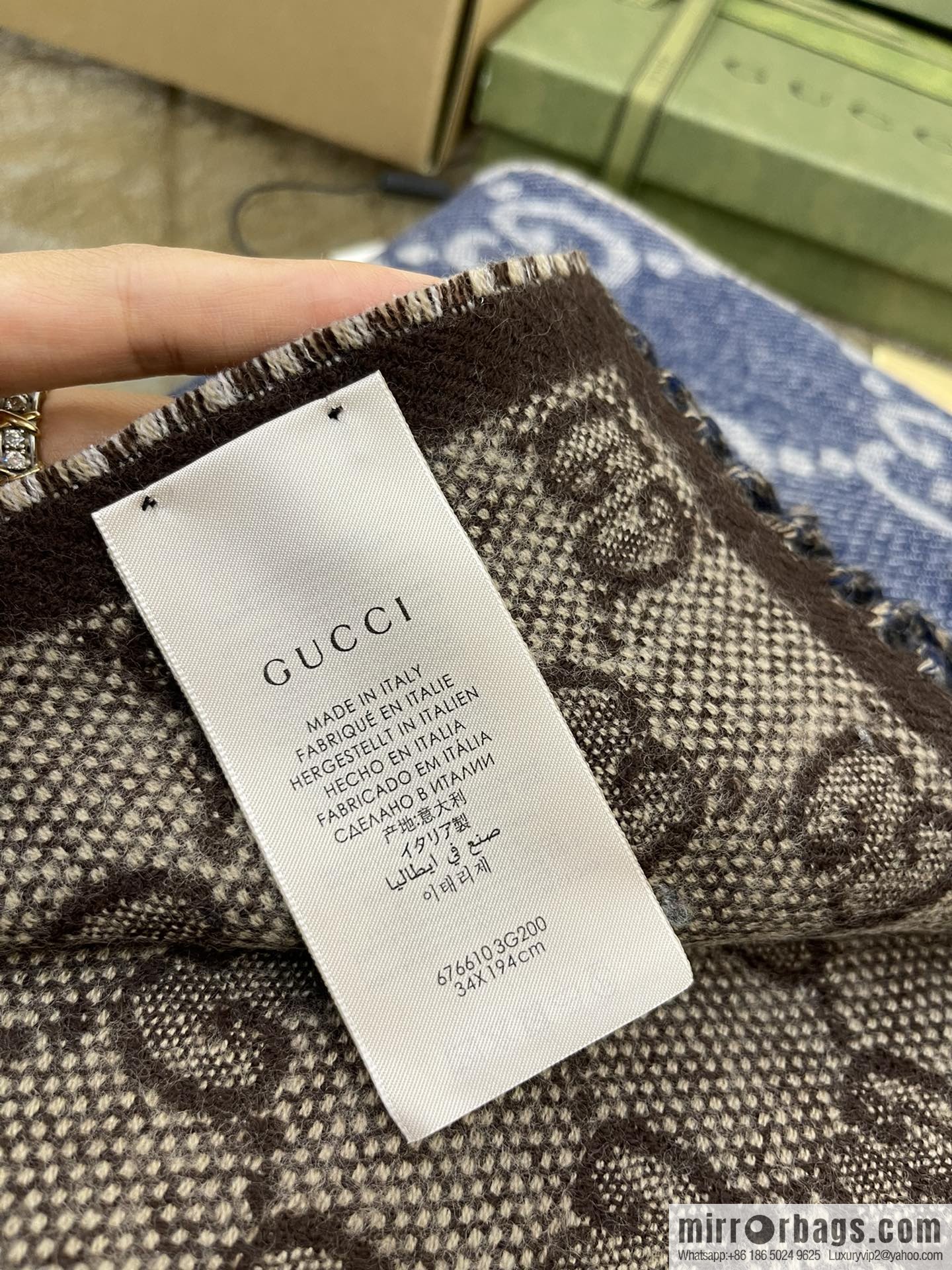 GUCCI Gucci GG pattern double-sided wool scarf 676610