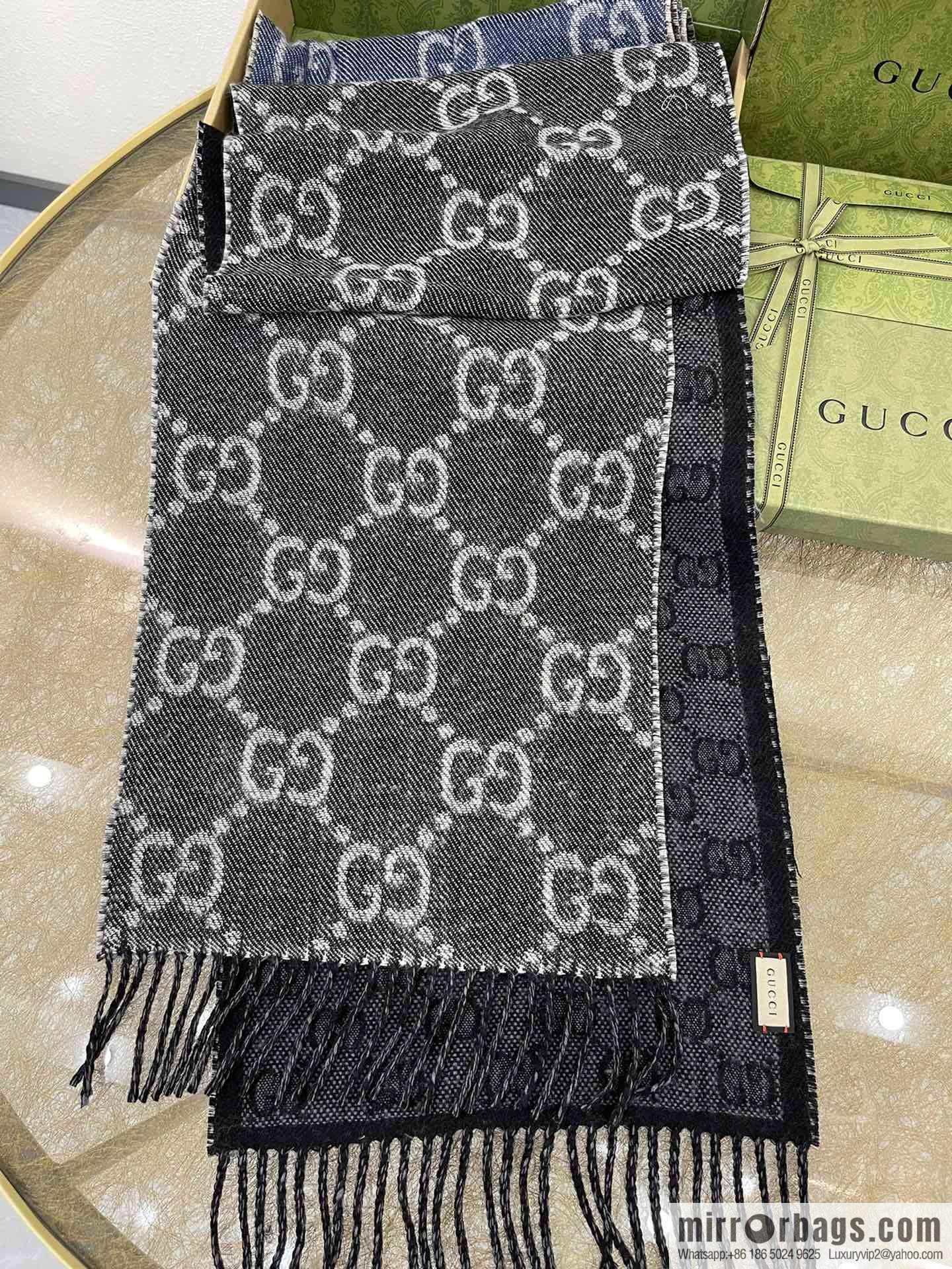 GUCCI Gucci GG pattern double-sided wool scarf 676610
