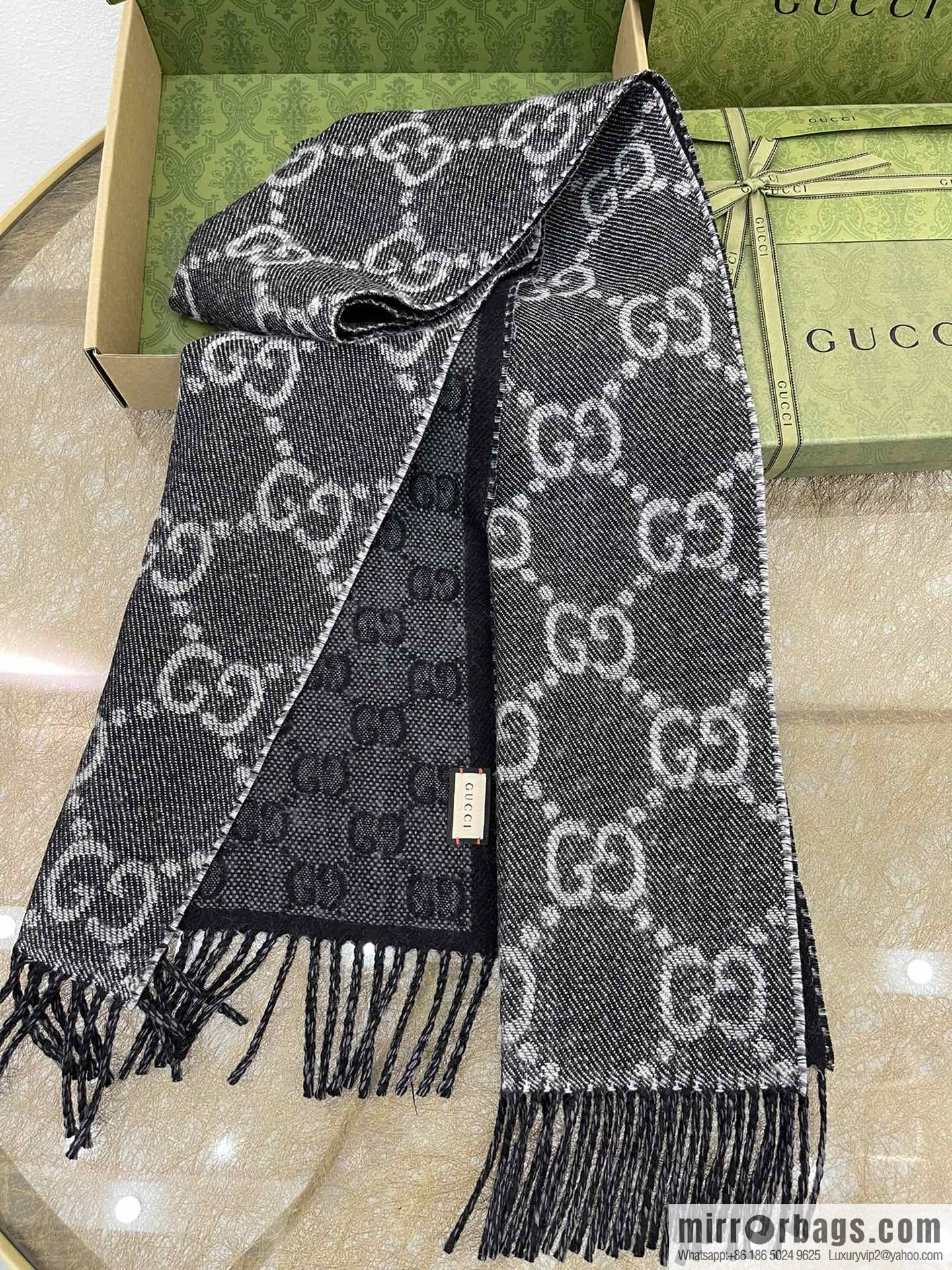 GUCCI Gucci GG pattern double-sided wool scarf 676610