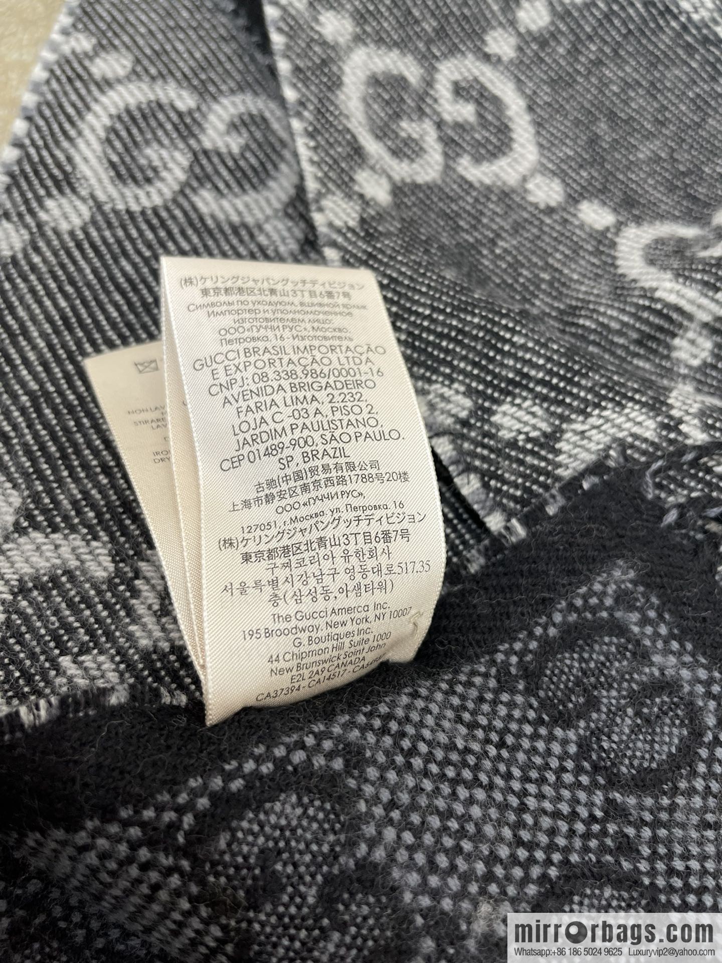 GUCCI Gucci GG pattern double-sided wool scarf 676610