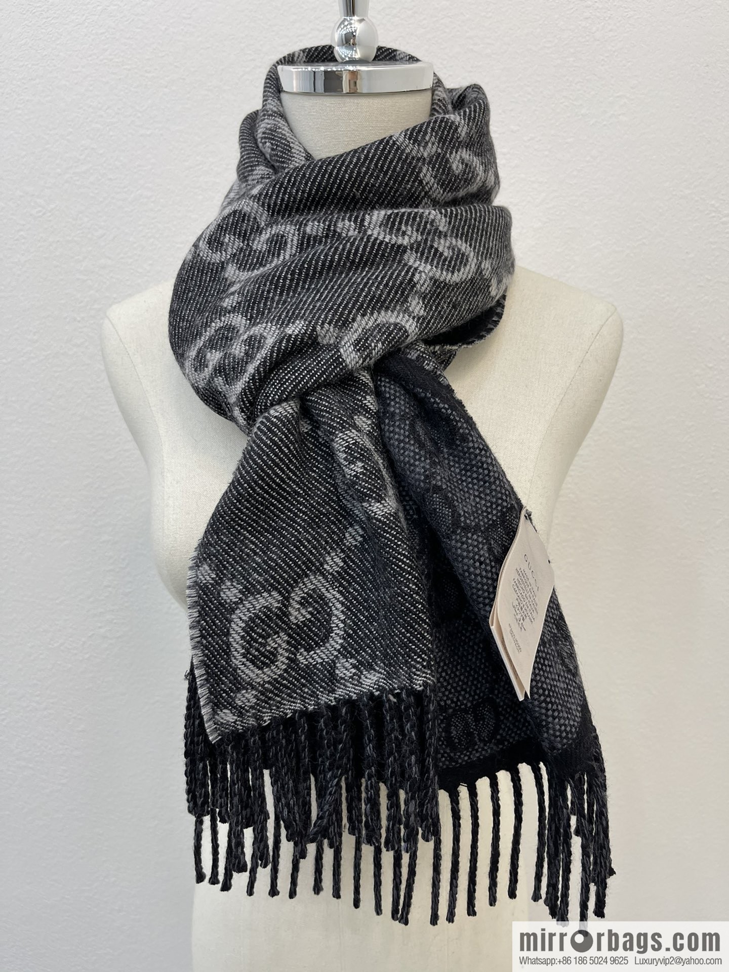 GUCCI Gucci GG pattern double-sided wool scarf 676610