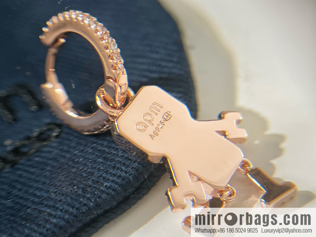 APM Monaco pink robot necklace stud earrings