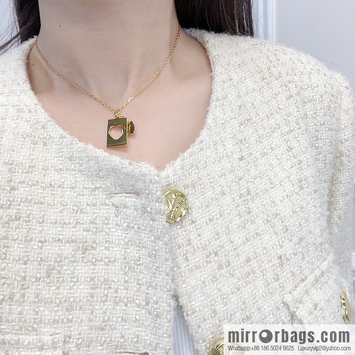 Celine cut-out peach heart necklace