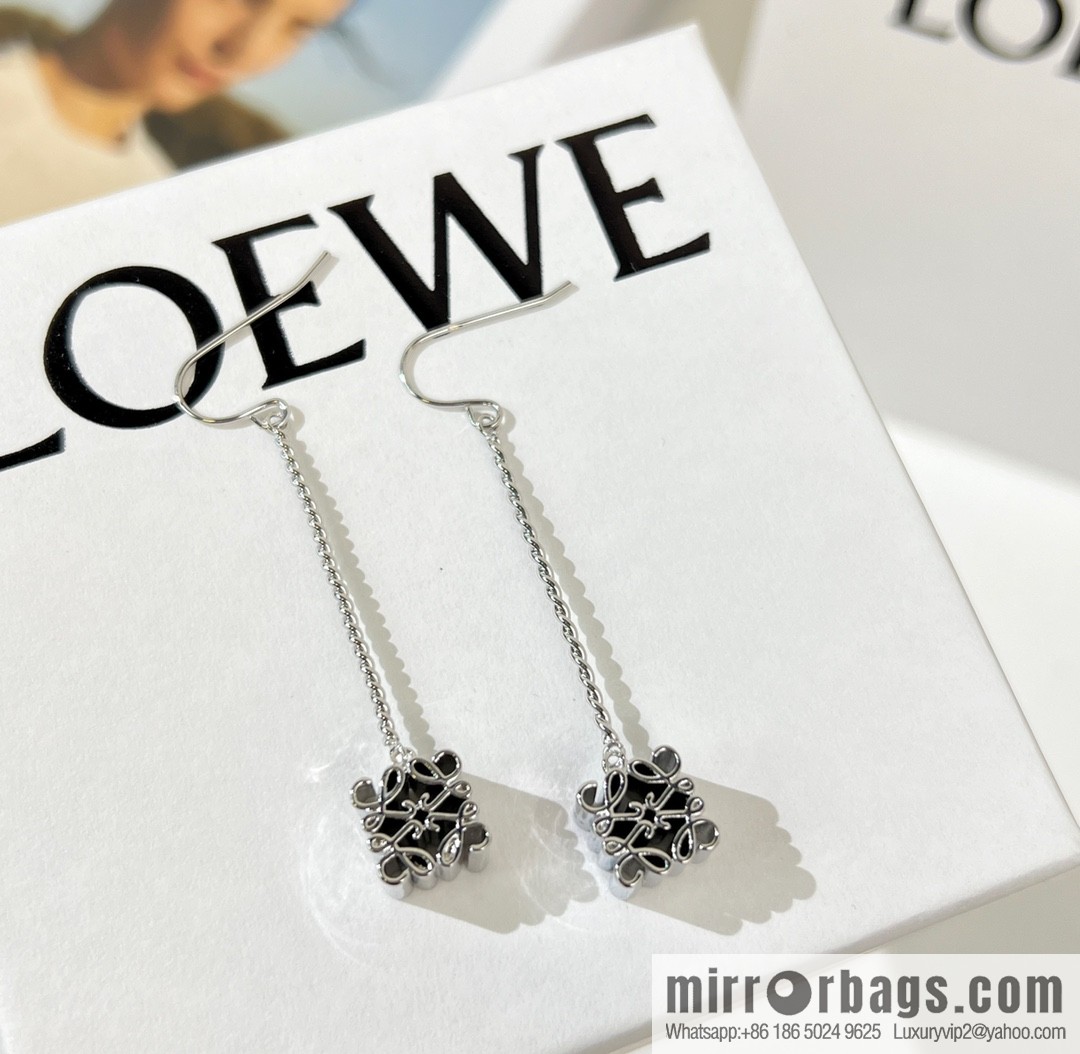 LOEWE long mooncake stud earrings