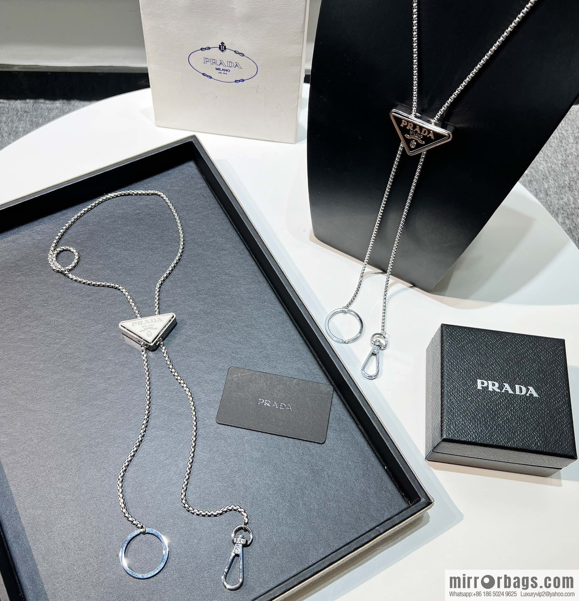 PRADA triangle, keychain necklace
