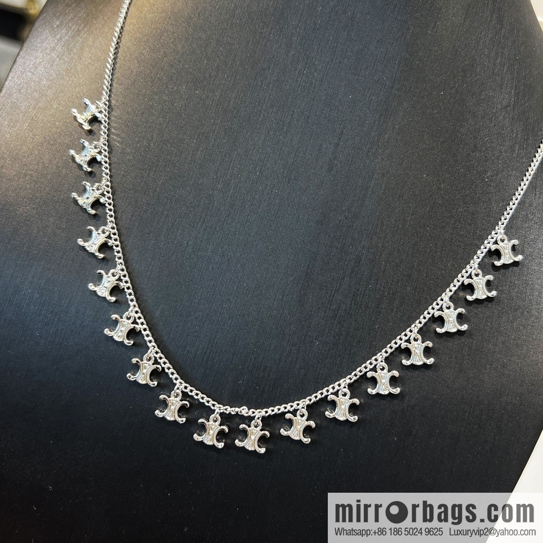 Celine Arc de Triomphe fringed necklace earrings