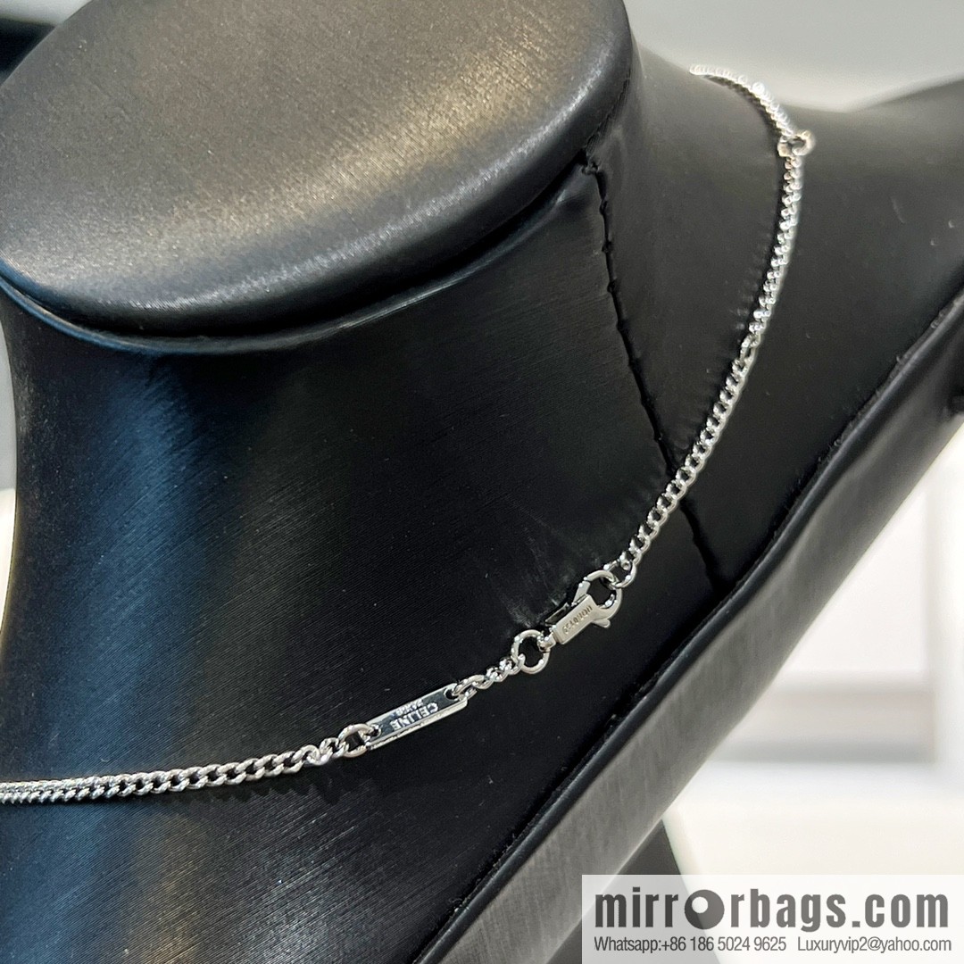 Celine Arc de Triomphe fringed necklace earrings