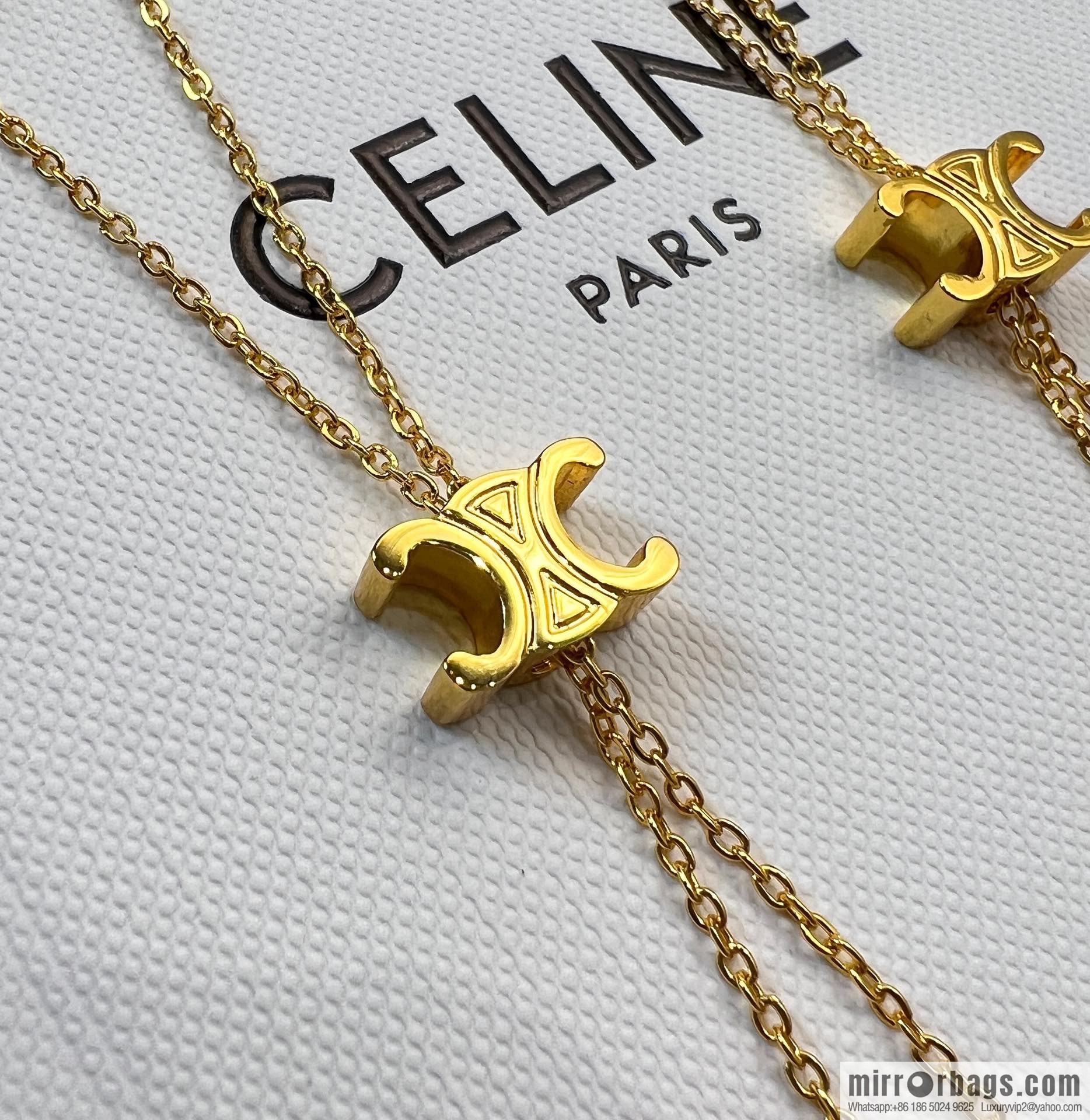 Celine Arc de Triomphe fringed necklace earrings