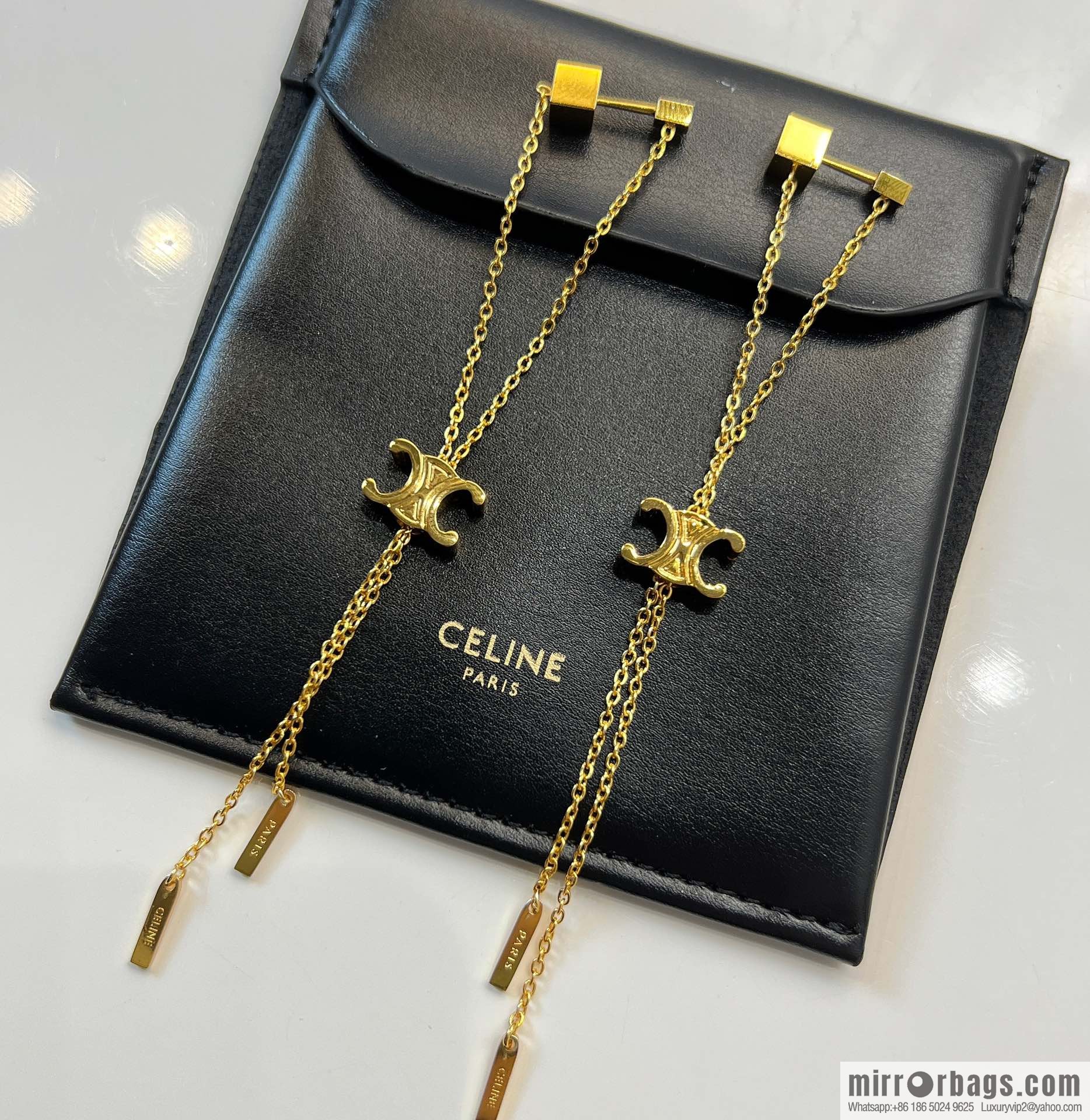 Celine Arc de Triomphe fringed necklace earrings