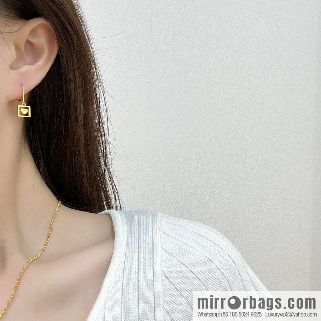 New Celine gold Arc de Triomphe peach heart stud earrings