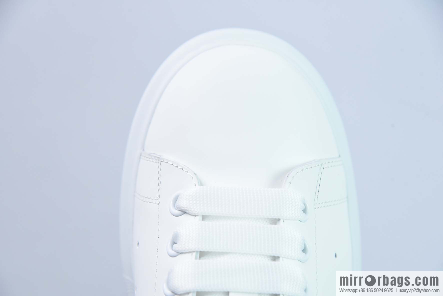 Alexander McQueen, pure white low-top sneakers