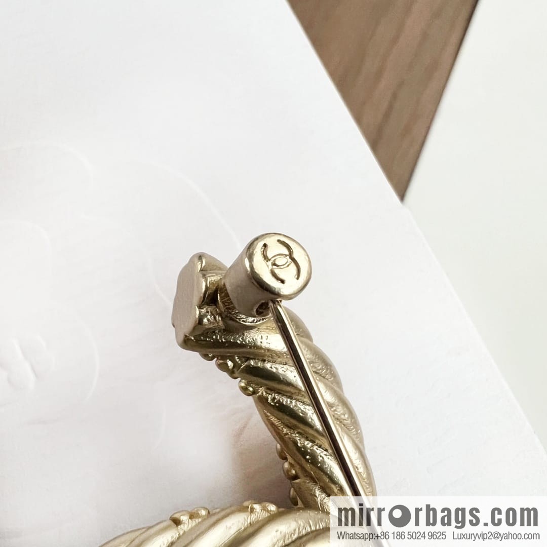 Chanel gold double c brooch