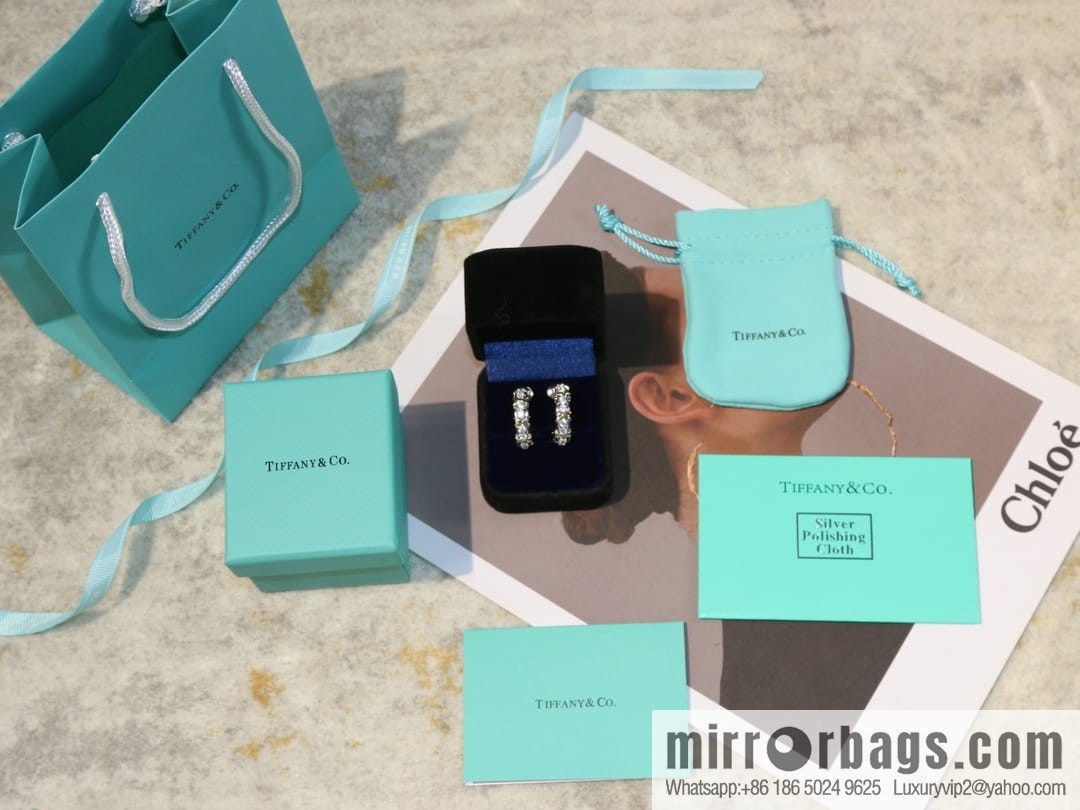 New ☑️ TIFFANY & Co. Tiffany & Co. Color separation cross stud earrings