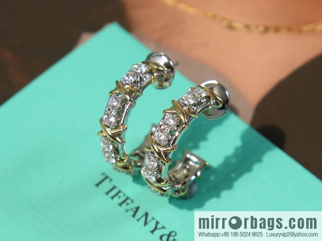 New ☑️ TIFFANY & Co. Tiffany & Co. Color separation cross stud earrings