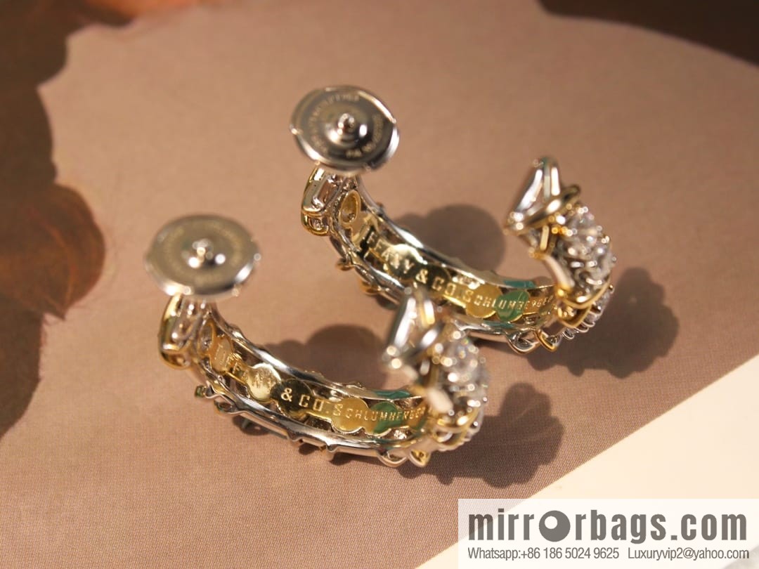 New ☑️ TIFFANY & Co. Tiffany & Co. Color separation cross stud earrings