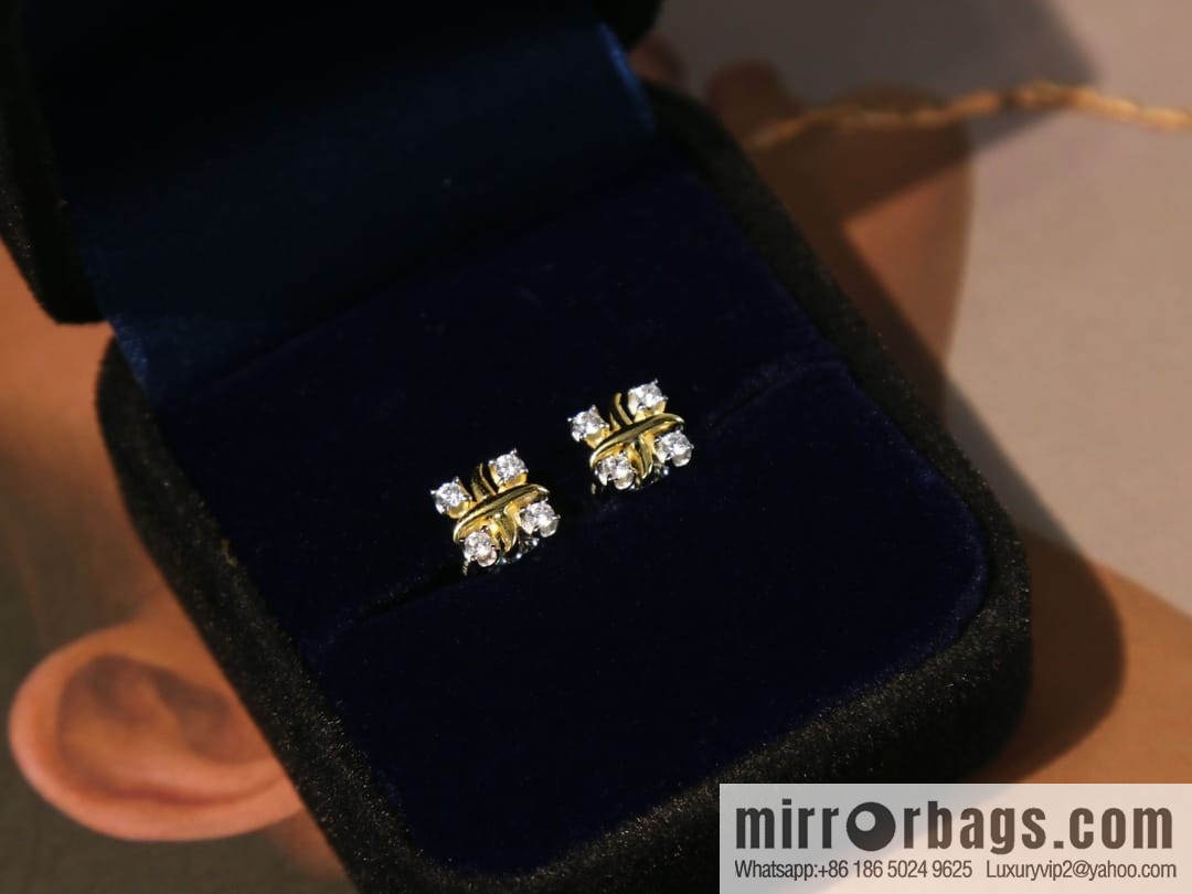 New ☑️ TIFFANY & Co. Tiffany & Co. Color separation cross stud earrings