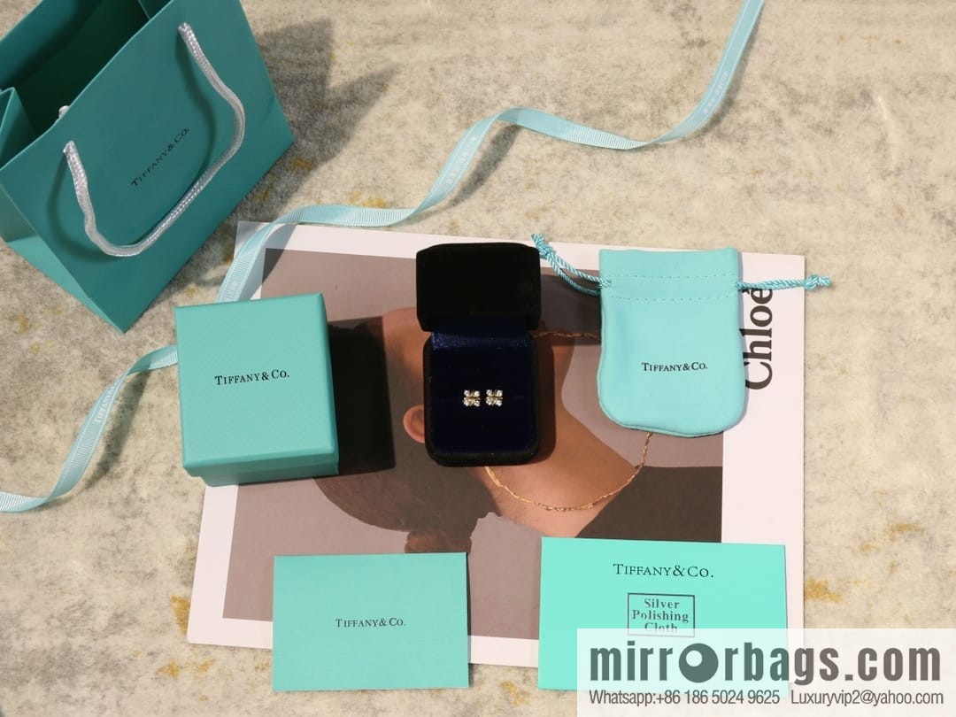 New ☑️ TIFFANY & Co. Tiffany & Co. Color separation cross stud earrings