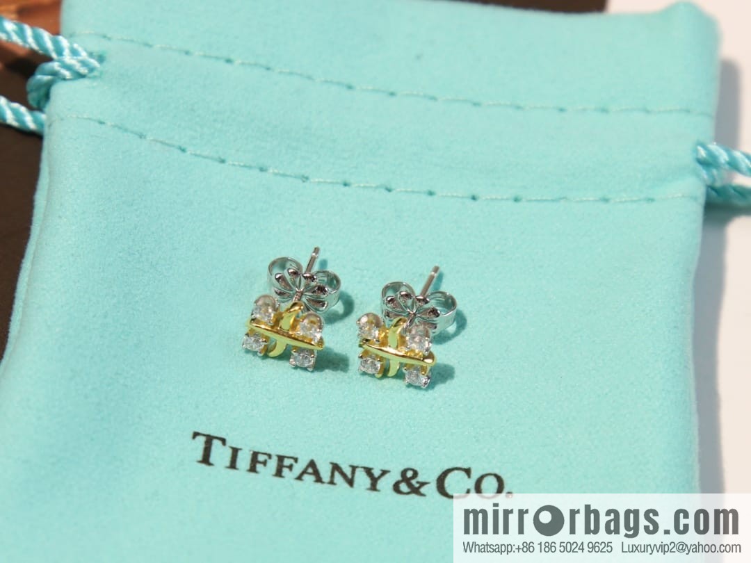 New ☑️ TIFFANY & Co. Tiffany & Co. Color separation cross stud earrings