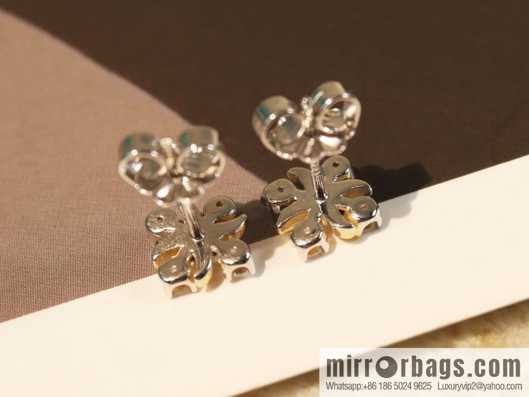 New ☑️ TIFFANY & Co. Tiffany & Co. Color separation cross stud earrings