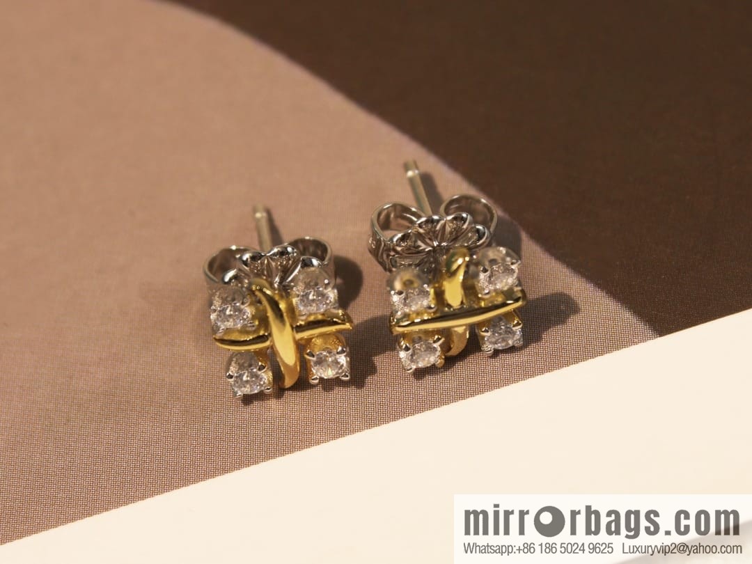 New ☑️ TIFFANY & Co. Tiffany & Co. Color separation cross stud earrings