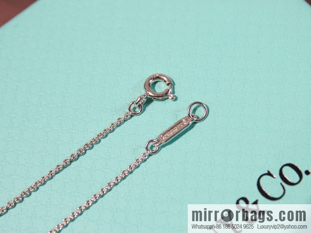 New ☑️ TIFFANY & Co. Tiffany & Co. Color separation cross necklace