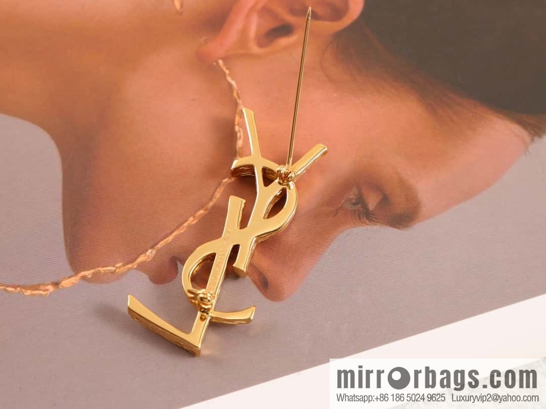 Saint Laurent gold YSL brooch