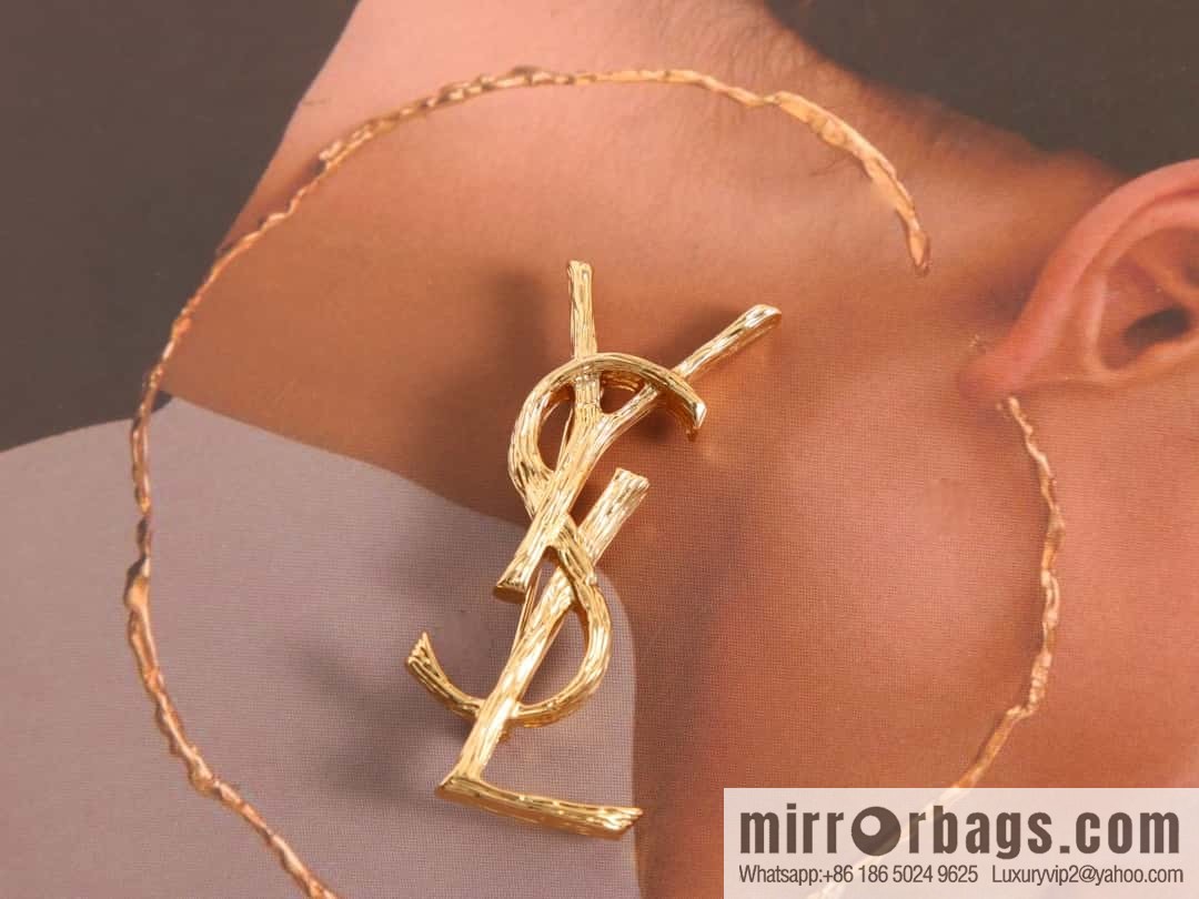 Saint Laurent gold YSL brooch