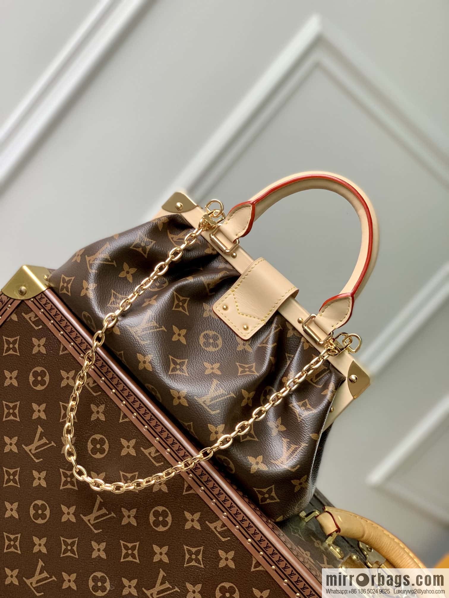 LV M46544 Monogram Clutch