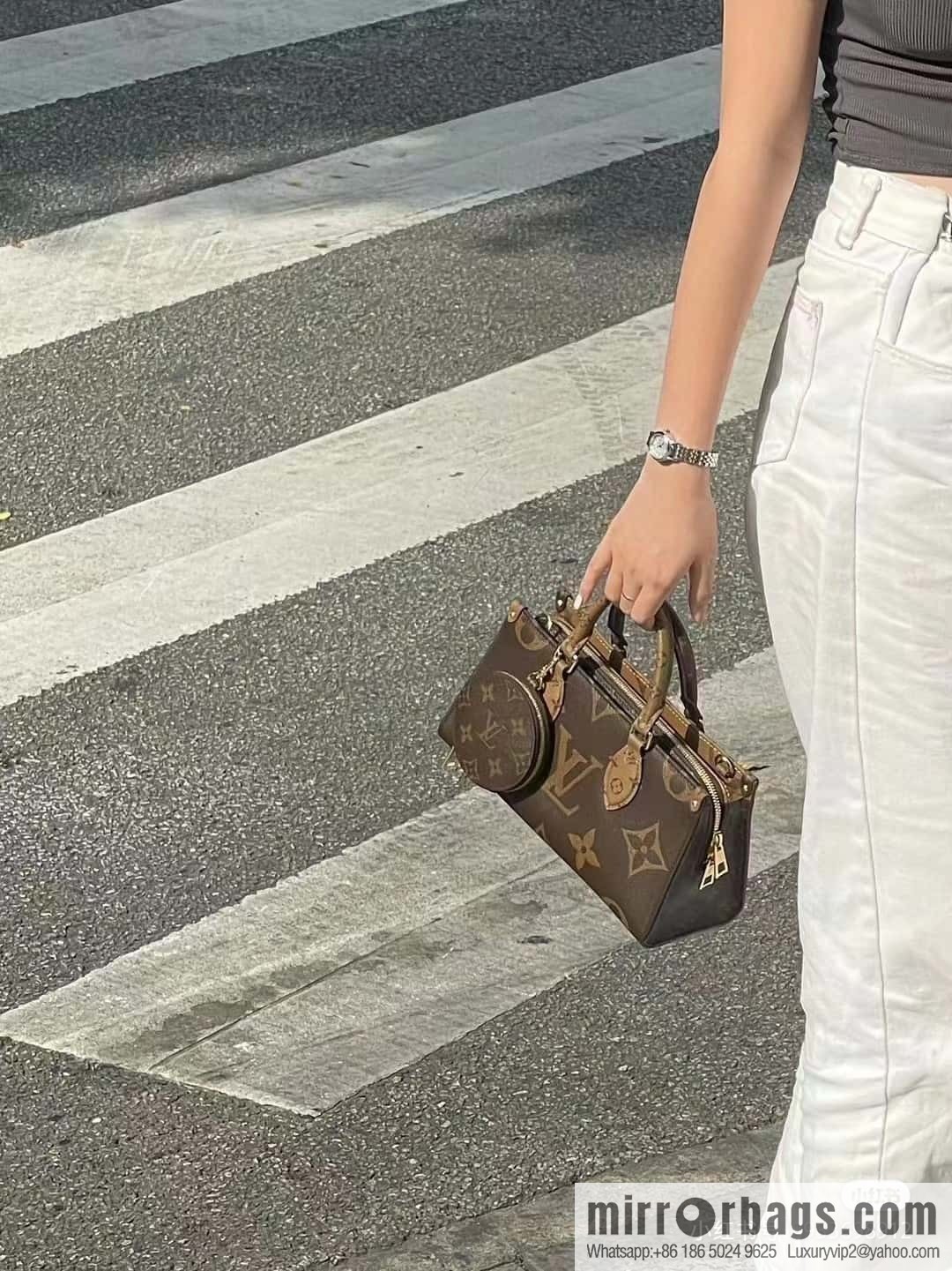 LV M46653 OnTheGo East West