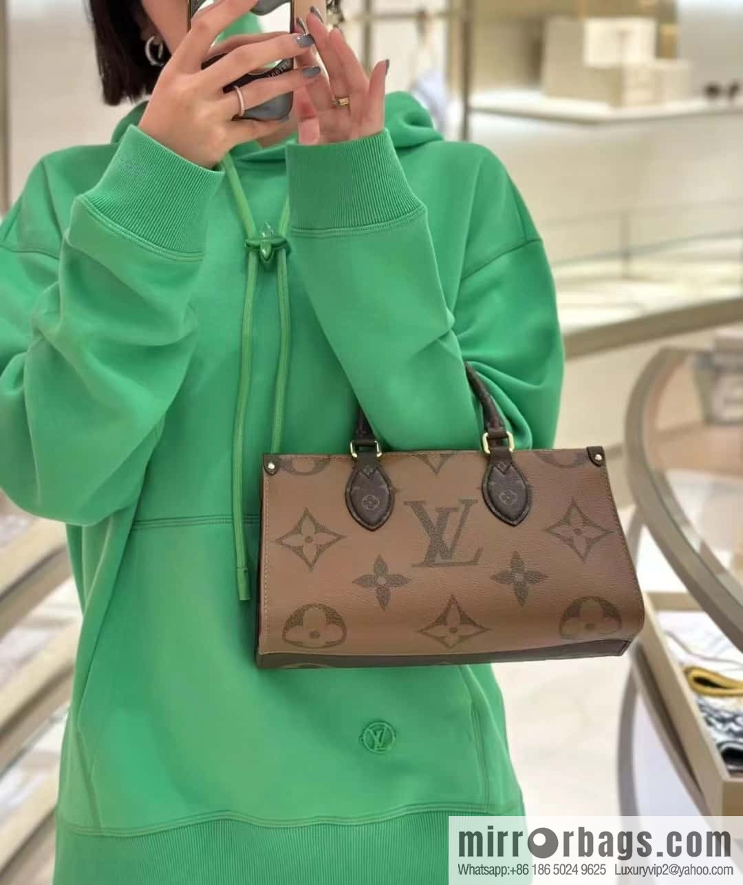 LV M46653 OnTheGo East West