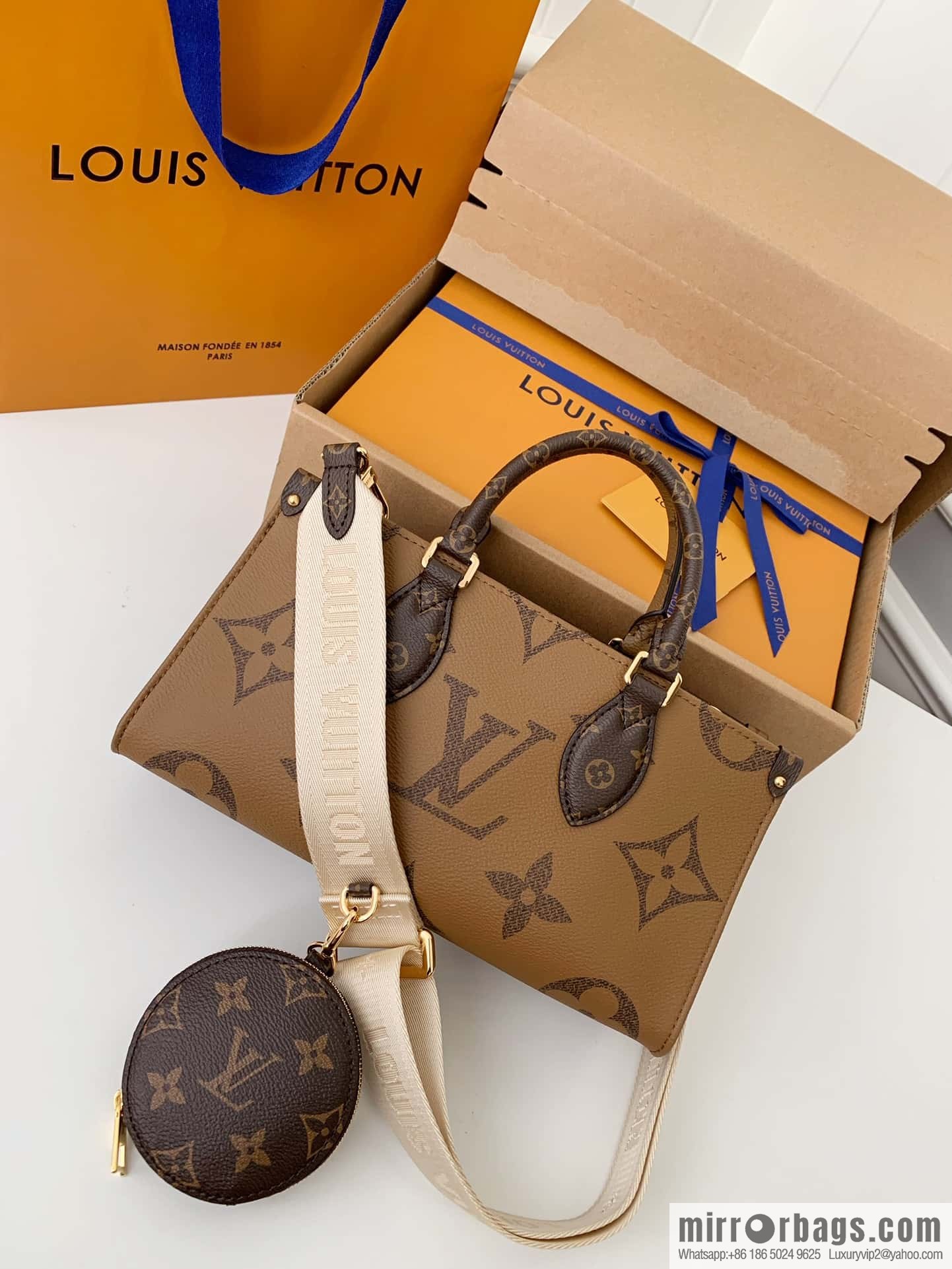 LV M46653 OnTheGo East West