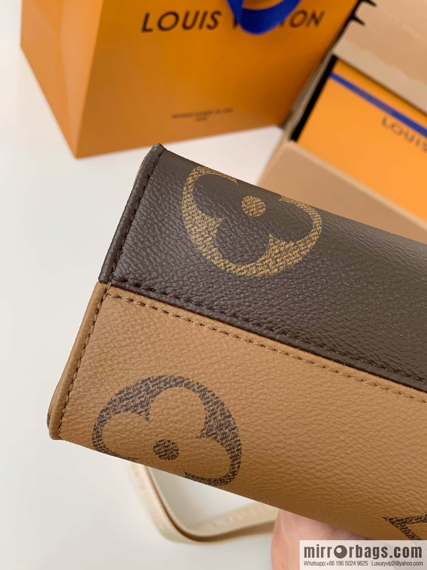 LV M46653 OnTheGo East West